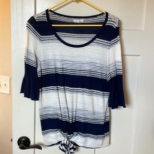 Three quarter length sweater.
